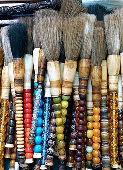 Collection of colourful calligraphy brushes